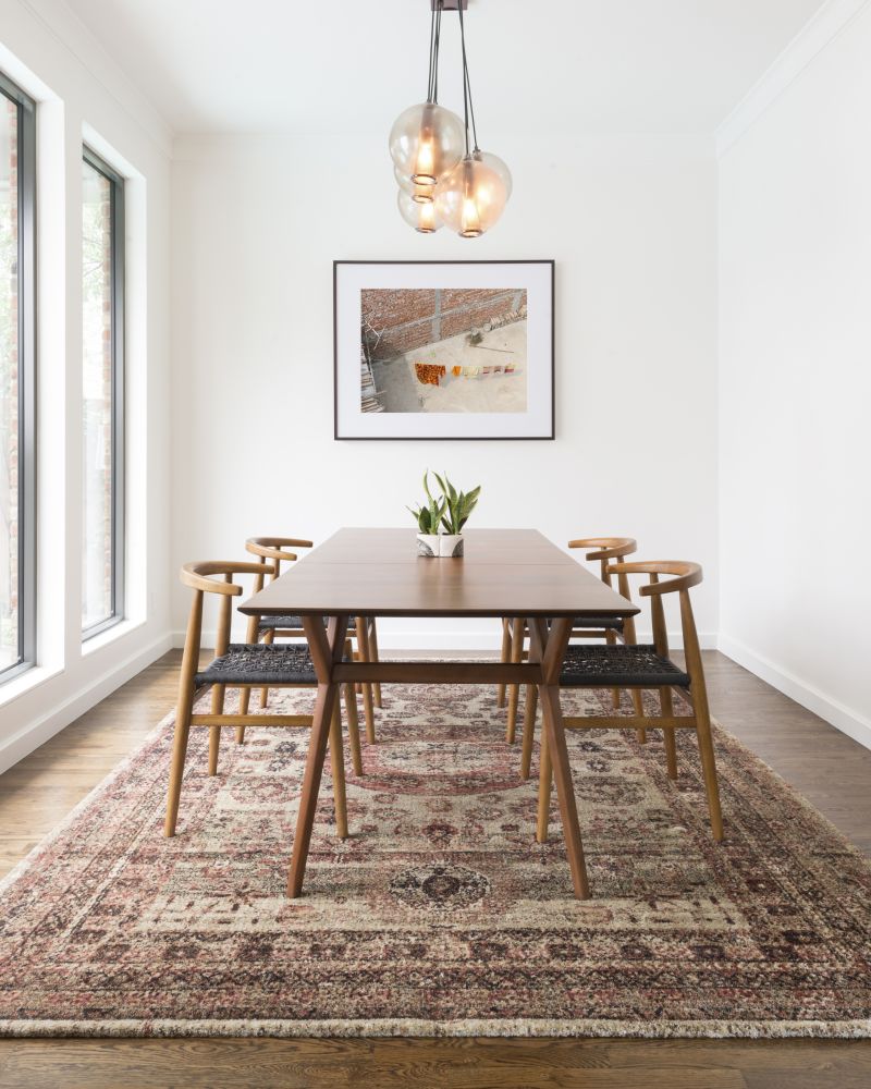 Use an Area Rug to Elevate Your Dining Room | Gillenwater Flooring