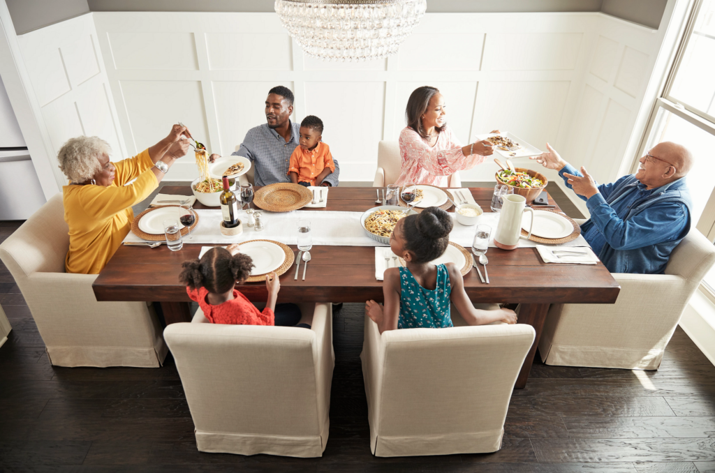 Family having breakfast at the dining table | Gillen Water Flooring